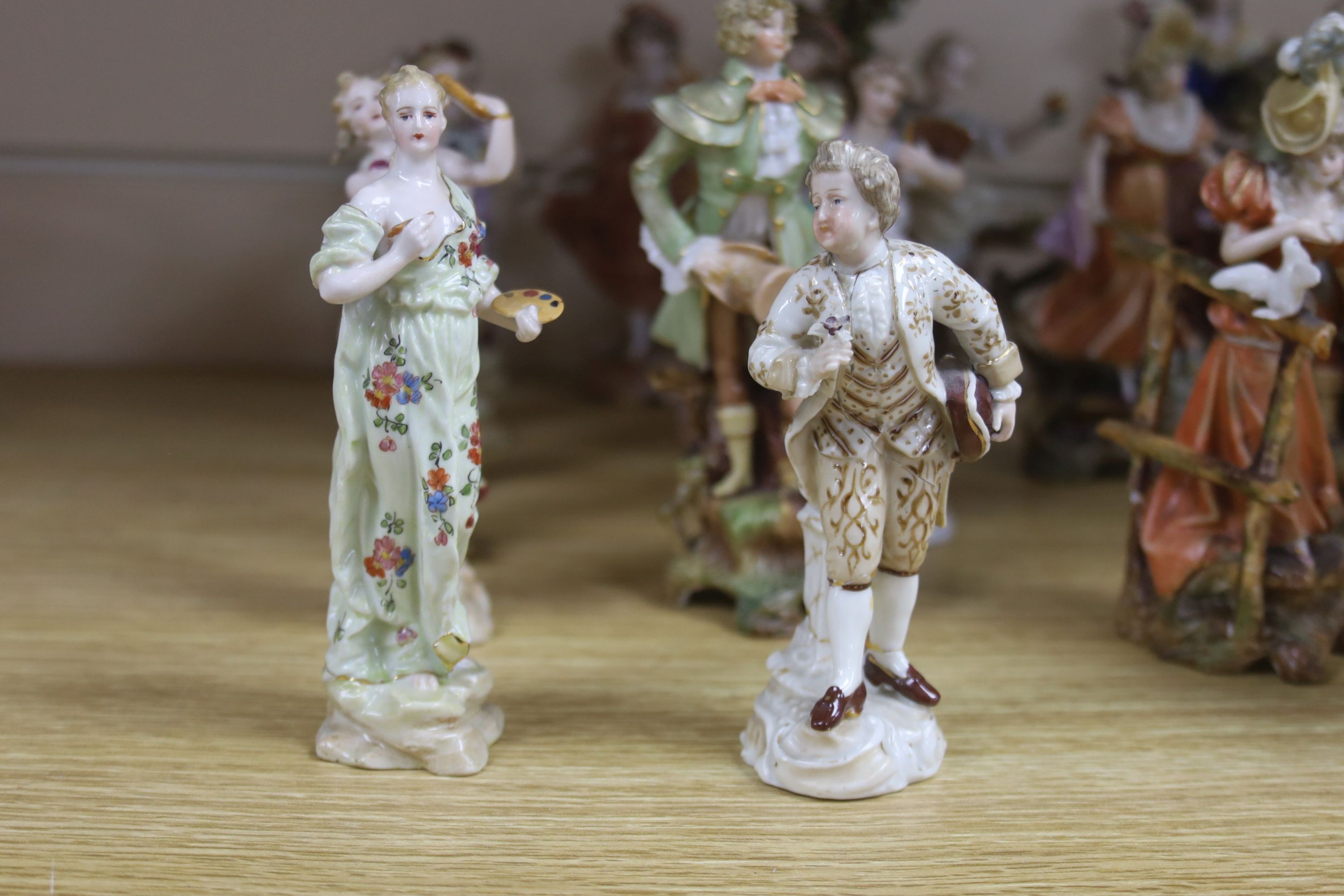 A collection of mixed Continental porcelain figurines (23)